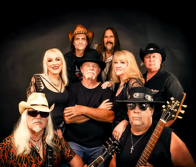 An image of eight members of Whiskey River.