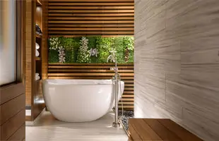 An image of an oval soaker bath tub in a serene setting.